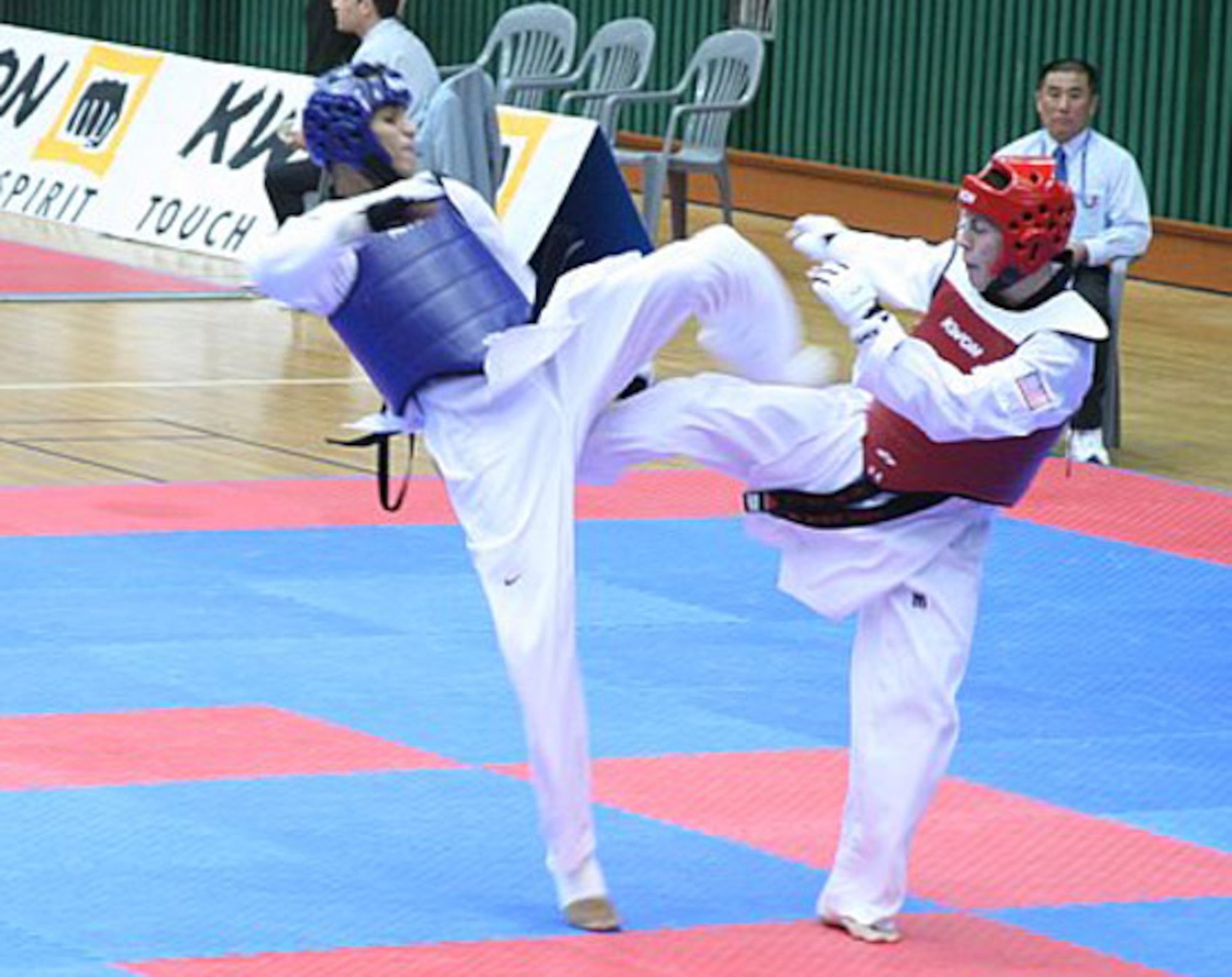 Seoul, Korea --  Airman  1st Class Jonathan Scherquist, right, spars with a military competitor from Saudi Arabia at the International Military Sports Council Taekwondo tournament , May 22. The U.S Armed Forces Taekwondo team fought their way to a fourth place finish. (courtesy photo) 