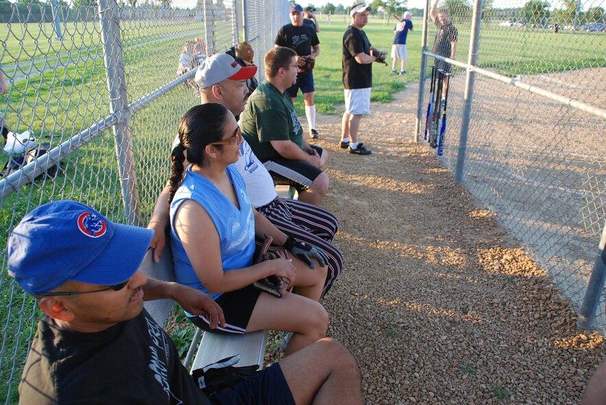 932nd Airlift Wing pilots, personnelists, and maintenance specialists, traded planes, pens and wrenches for balls and gloves as they prepared for a softball game in July. They went up against the feared security forces team and lost, but one maintainer commented, "It's a good time for wing members and the weather was great." Photo/Maj. Stan Paregien