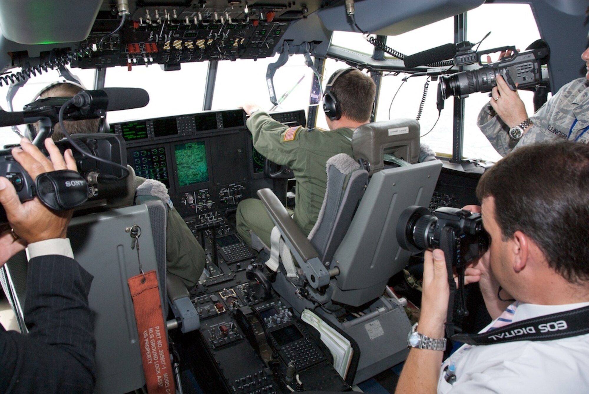 Lt. Col Brian Freeman and Lt. Col. David Russell pilot the aircraft around the United Kingdom while eager cameras look on.  Media Day at the world's largest air show in Farnborough, England was a huge success for the Air Force Reserve Flying Jennies. Nearly 50 media flew along documenting the Reserve mission in the C-130J and the unique capabilities of the most technologically advanced C-130 ever.  The Farnborough Air Show will be open to the public Saturday and Sunday, July 19-20, 2008.