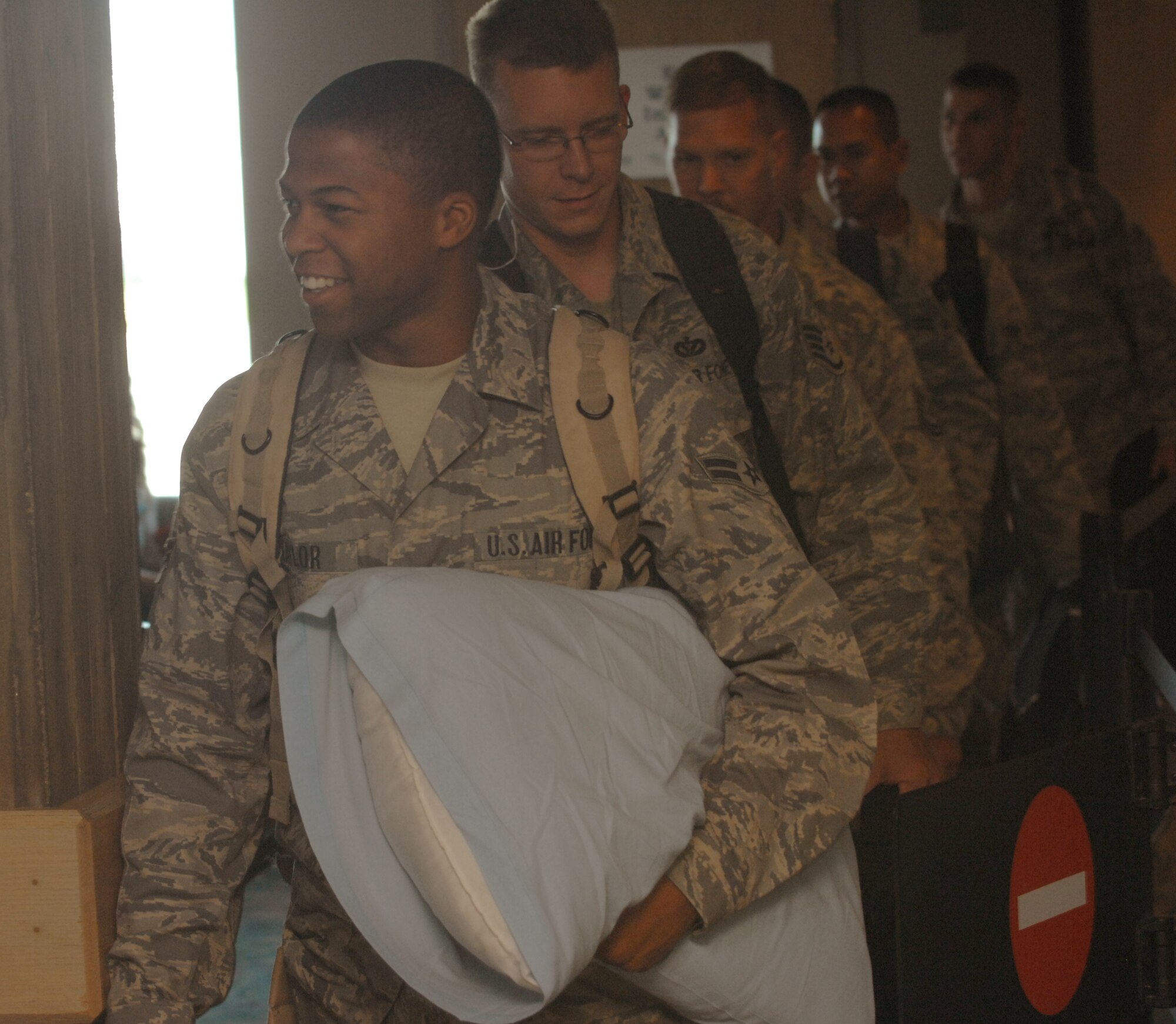 Members of the 28th Civil Engineer Squadron return home from a six-month deployment to Balad Air Base, and are welcomed by family and friends at Rapid City Regional Airport in Rapid City, S.D., July 17.While serving at Balad, members of the 28 CES provided rapid, decisive and sustainable mission support to Operations Iraqi Freedom and Enduring Freedom. (US Air Force Photo/ Airman 1st Class Adam Grant)  