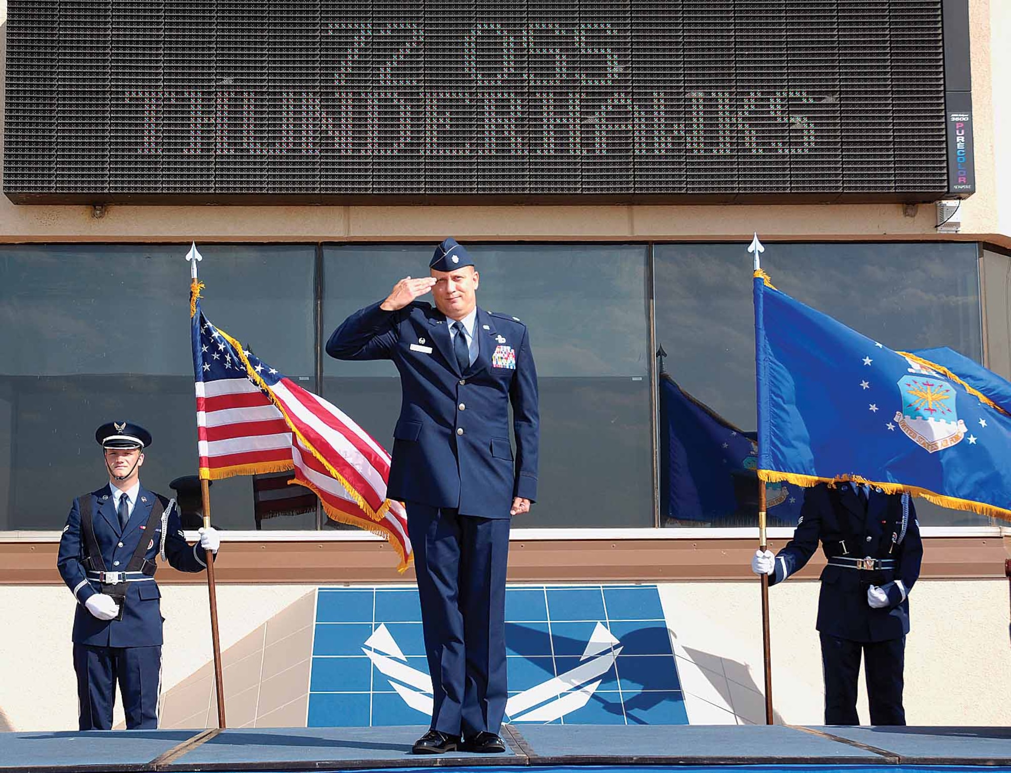 New 72nd Operations Support Squadron Commander Lt. Col. Jay "T.J." Stull salutes his troops after taking command July 1.  (Air Force photo by Dave Faytinger)