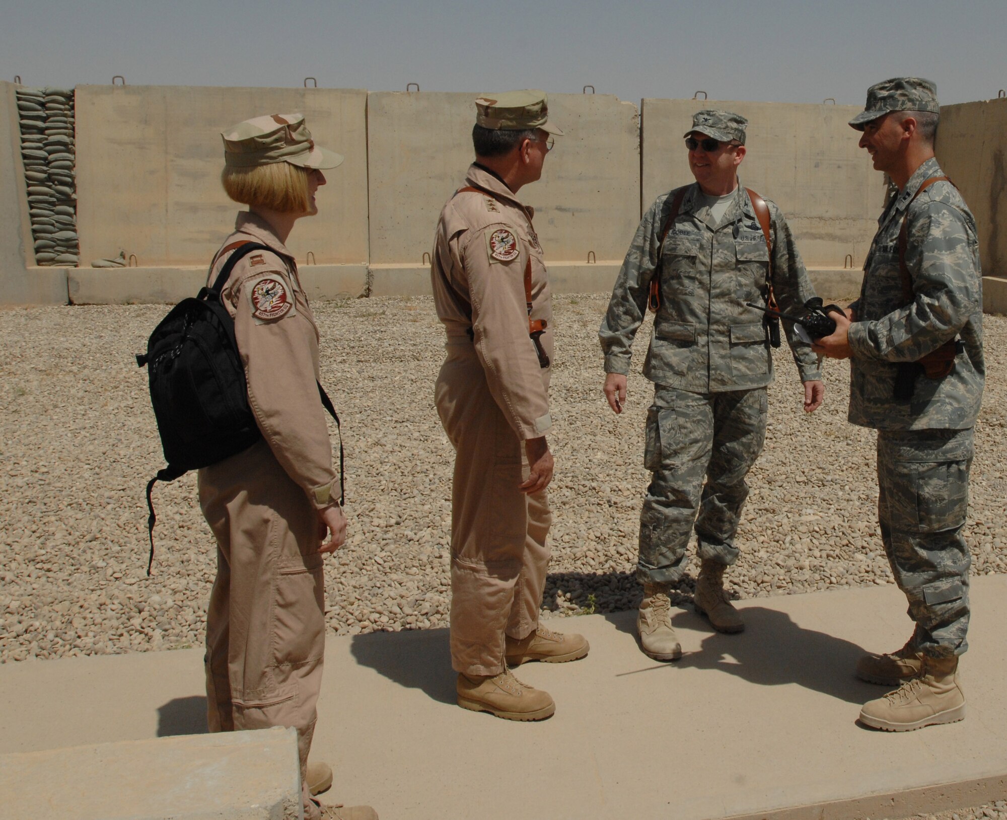932nd Airlift Wing deployed member Capt. Brian Hodge (far right) had a chance to visit with the Chief of the Air Force Reserve Command, Lt. Gen. John Bradley (second from left) before his recent retirement during a visit to Kirkuk Regional Air Base, Iraq.  Photo submitted by Captain Hodge.