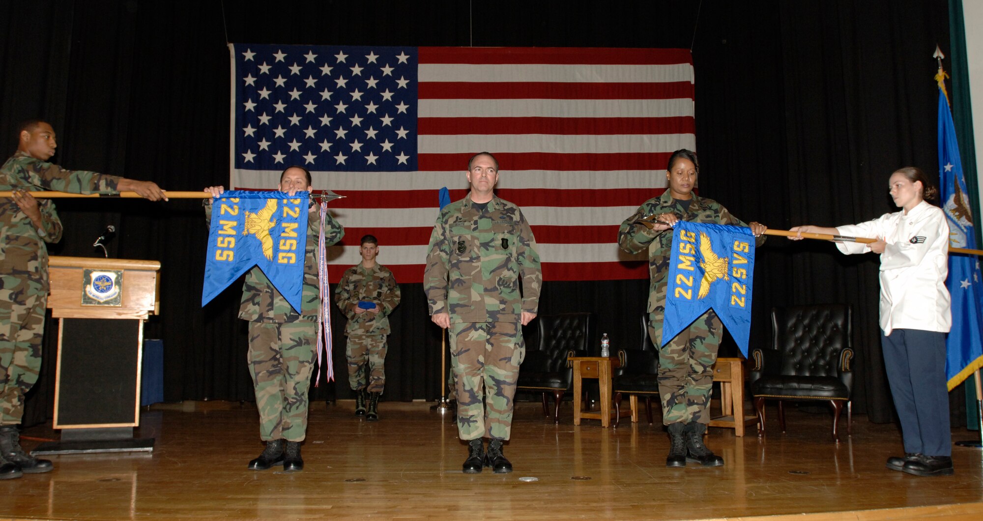 MCCONNELL AIR FORCE BASE, Kan. – Colonel Mark White, 22nd Mission Support Group commander, officiates a re-designation ceremony that merges the 22nd Services Squadron and 22nd Mission Support Squadron at the Robert J. Dole Center ballroom, July 11. The combined squadrons form the 22nd Force Support Squadron. (Photo by Staff Sergeant Jamie Train)