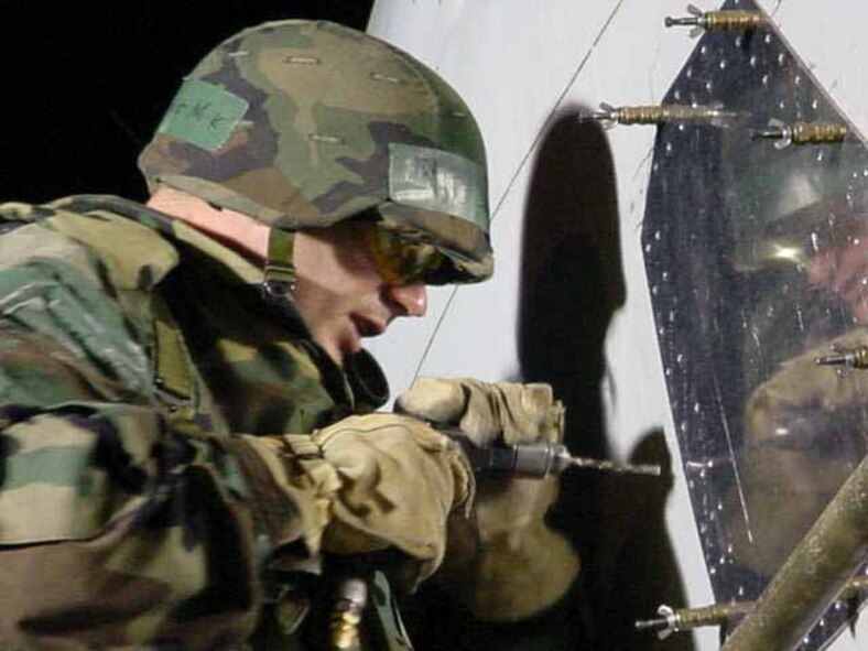 Tech. Sgt. Lindenbarger repairs a C-135 during a 654th CLSS squadron Aircraft Battle Damage Repair exercise.  (Courtesy photo)