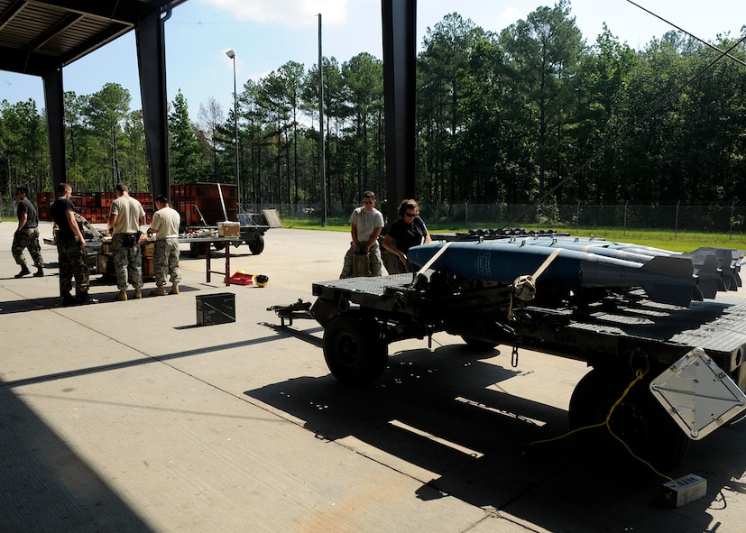 MOODY AIR FORCE BASE, GA. -- Airmen of the 23rd Equipment Maintenance Squadron prepare to build live MK-82 500 lb. general purpose bombs here July 17. The bombs were used on an A-10C Thunderbolt II training flight the following week. (U.S. Air Force photo by Senior Airman Brittany Barker)