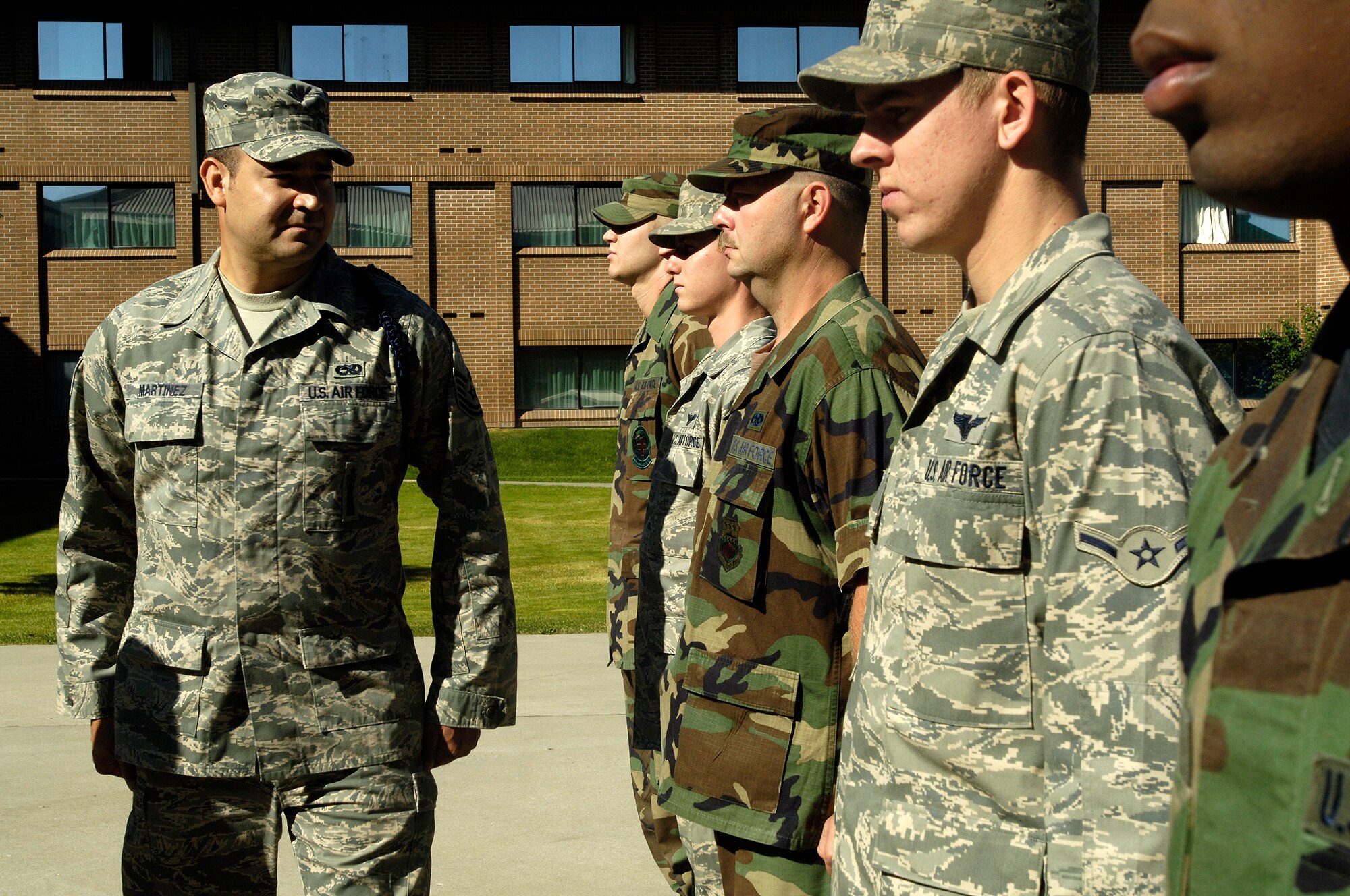 FAIRCHILD AIR FORCE BASE, Wash. – Tech. Sgt. Gregorio Martinez, 66th Air Training Squadron chief military training leader, performs an open ranks-inspection on students in the 66th TRS. He receives high praises from the 66th TRS for all his hard work. (U.S. Air Force photo / Senior Airman Eunique Stevens)
