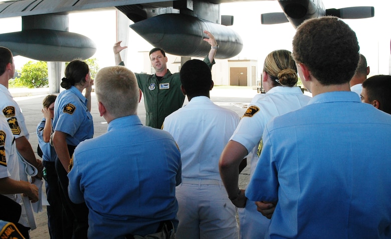 Maj. John Brodeur, an aircraft commander with the 39th Rescue Squadron, shows some of the finer points of a C-130 cargo plane to a group of U.S. Naval Sea Cadets July 10. The 34 cadets came from all over the country and from the local community, including Major Brodeur’s son. The cadets spent a week visiting Patrick Air Force Base, volunteering in various offices such as the 920th Rescue Wing Public Affairs office, the 45th Space Wing Judge Advocate office and the Defense Equal Opportunity Management Institute. (U.S. Air Force photo by Airman 1st Class David Dobrydney)
