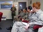 First Lt. Roy Blount, 12th Medical Operations Squadron, speaks with Airmen during their annual physical health assessment in a 12th Medical Group briefing room July 16. A change to the PHA process Aug. 1 will allow people undergoing the exam to spend one-on-one time with health practitioners instead of the current process that puts people in groups. (U.S. Air Force photo by Rich McFadden)