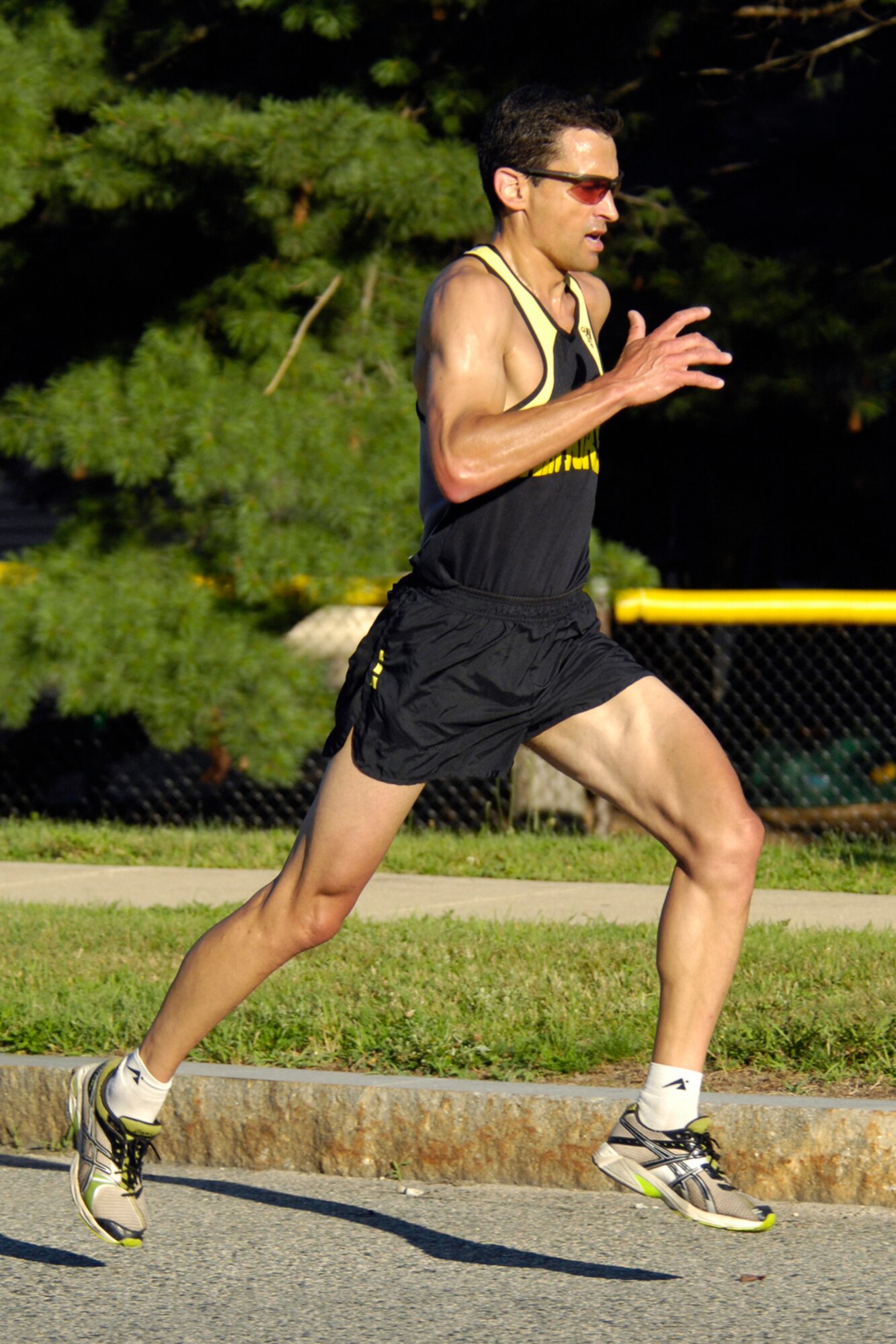 HANSCOM AFB, Mass. -- Retired Lt. Col. Jon Schoenberg, Air Force Research Laboratory, maintains a fast pace during the Fitness and Sports Center's Firecracker Fitness 5K Fun Run July 16. For a list of Fitness Center classes and events, visit www.hanscomservices.com. (U.S. Air Force Photo by Linda LaBonte Britt.)