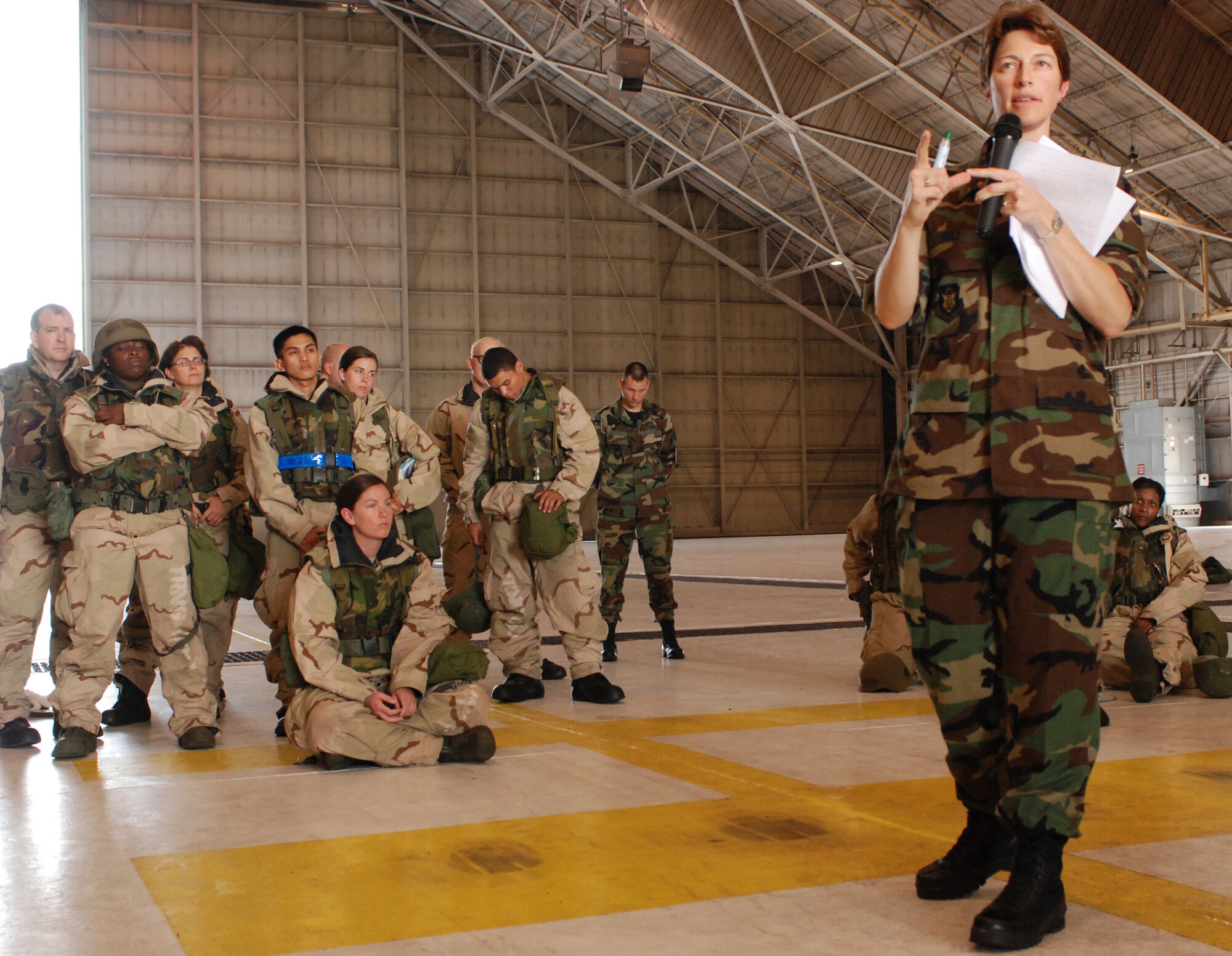 Maj. Stephanie Holt, 512th Aerospace Medicine Squadron, refreshes servicemembers on Self Aid Buddy Care procedures in Building 639 here. 512th Airlift Wing reservists participated in various refresher training sessions over the July Unit Training Assembly in preparation for the upcoming Operational Readiness Inspection. (U.S. Air Force photo/Staff Sgt. Steve Lewis)