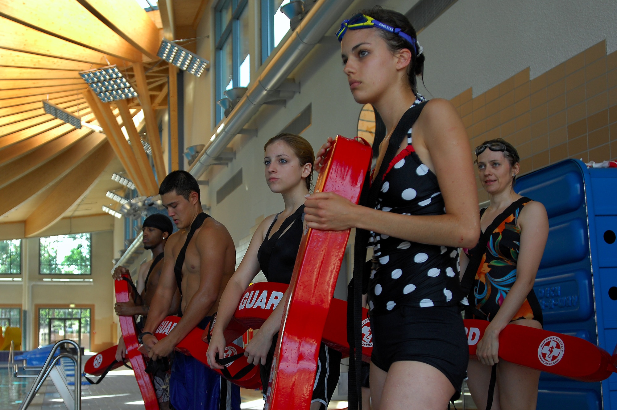 Students participating in life guard training at the new aquatic center on Ramstein Air Base, Germany wait for further instruction July 10, 2008. Several teenagers and adults participated in the training in anticipation of the opening of the new facility. (U.S. Air Force photo by Airman 1st Class Kenny Holston)(Released)