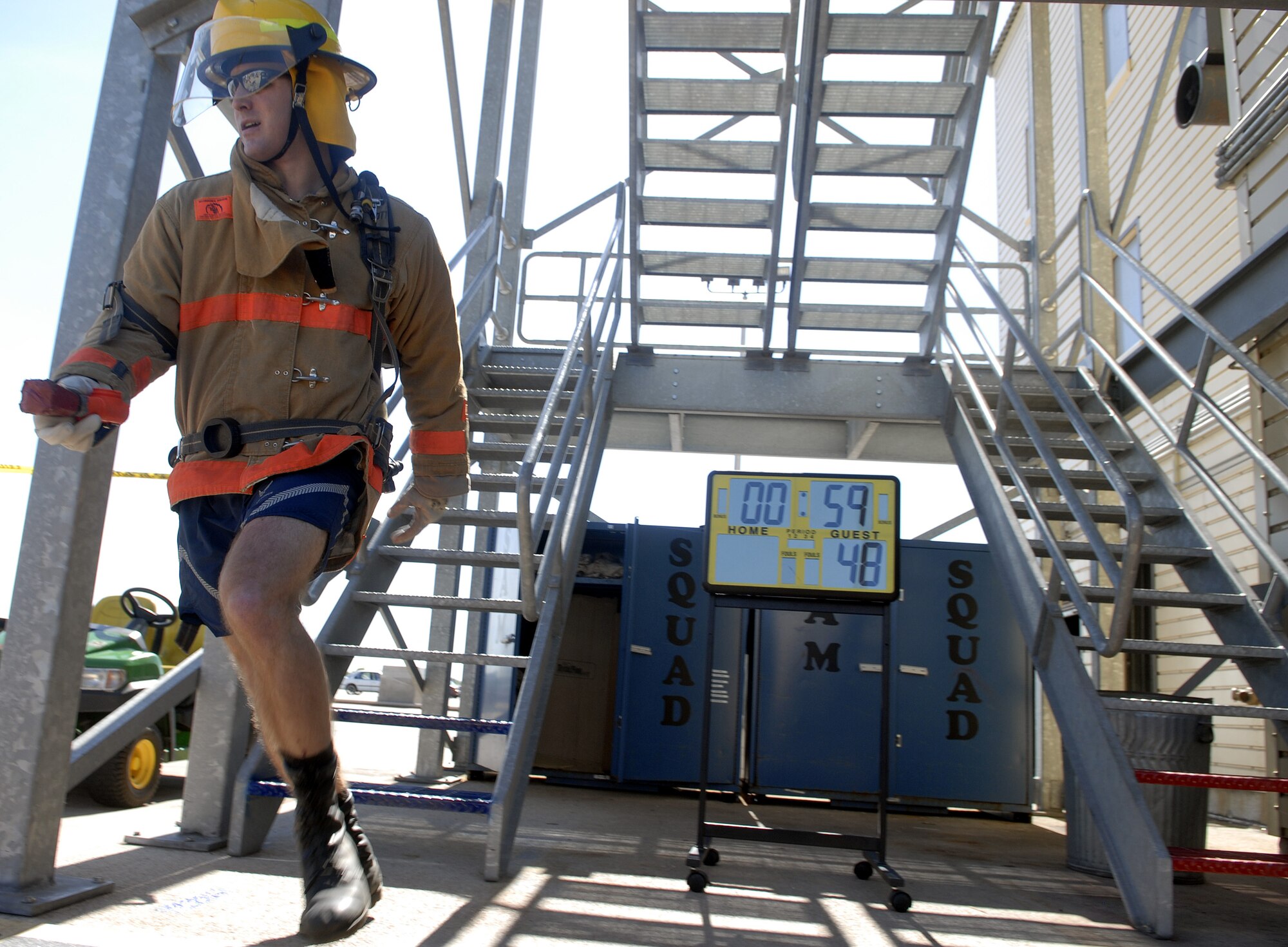 Staff Sergeant Christopher Clark, 312th Training Squadron SPINSTRA instructor, races down the stairs during the challenge. (U.S. Air FOrce photo by Senior Airman Kamaile Chan)