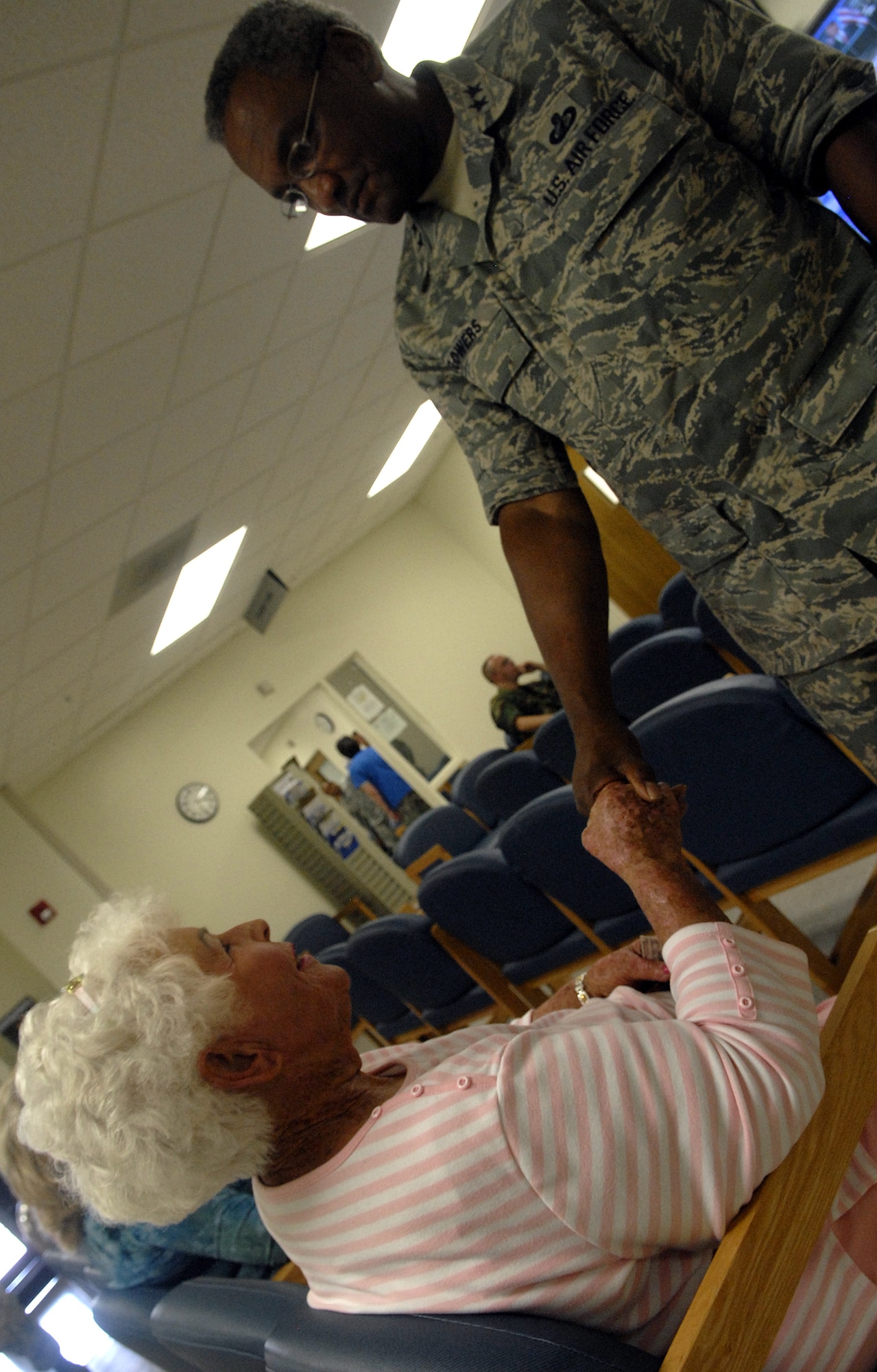 General Flowers greets a customer at the 17th Medical Group during his visit to Goodfellow Air Force Base July 15. (U.S. Air Force photo by Senior Airman Kamaile Chan)