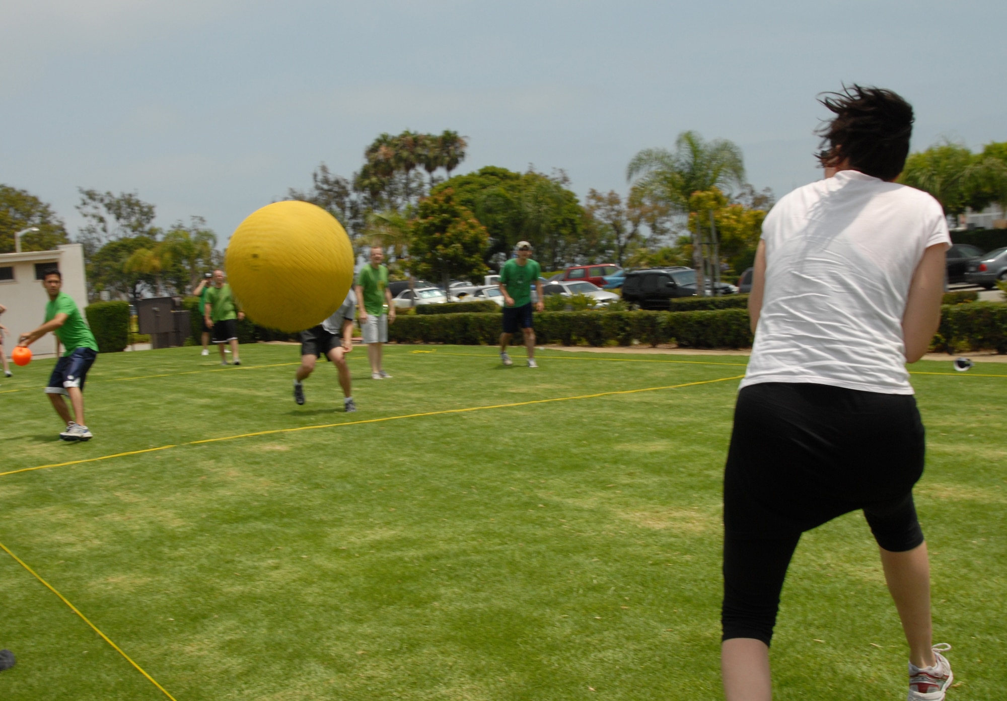 A dodge ball player narrowly misses being hit during a game during SMC’s Sports Day, July 10. The Space Superiority Systems Wing took this year’s overall Sports Day crown.  (Photo by Joe Juarez)  