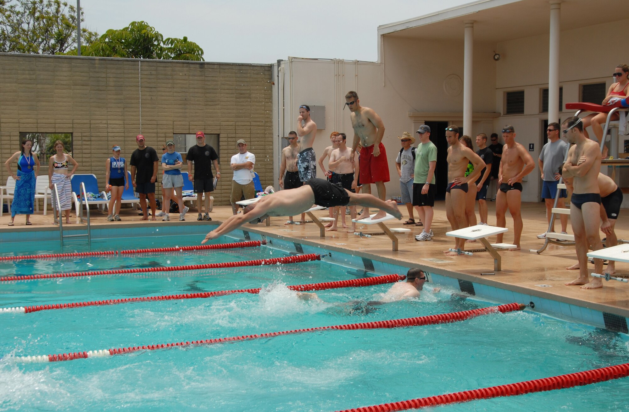 Teams compete in the swimming relay during SMC’s Sports Day, July 10. The Space Superiority Systems Wing took this year’s overall Sports Day crown.  (Photo by Joe Juarez)  
