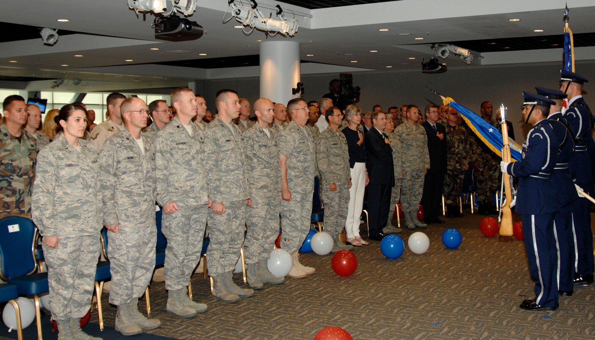 Los Angeles Air Force Base Honor Guard faces the bases’ recently returned deployed members during the “Welcoming Home of the Troops” celebration held in the Gordon Conference Center at Los Angeles Air Force Base, July 16. (Photo by Lou Hernandez)