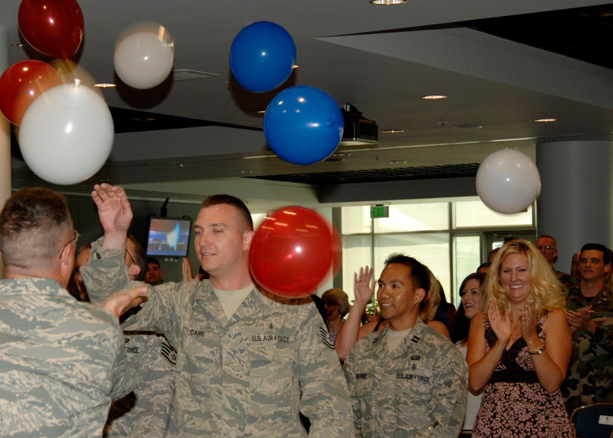 Recently returned deployed members of Los Angeles Air Force Base were greeted with a flurry of red, white, and blue balloons during the “Welcoming Home of the Troops” celebration at Los Angeles Air Force Base, July 16. (Photo by Lou Hernandez)