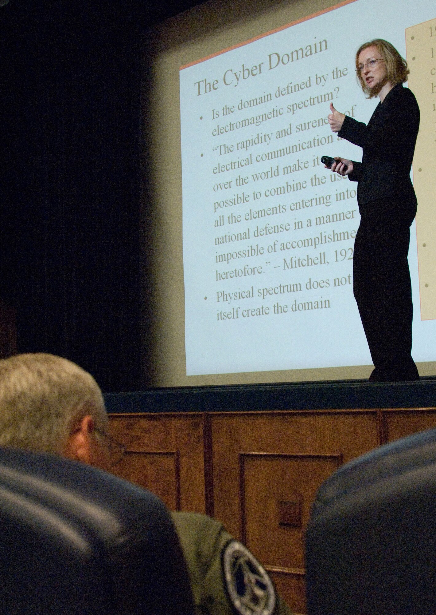 Dr. Rebecca Grant, president of IRIS Independent Research, speaks to attendees July 15 at the Cyberspace Symposium at Maxwell Air Force Base, Ala., on policy issues and the nature of cyberspace.  The symposium brought some 250 professional civilian and military experts who gathered to discuss the implications of cyberspace as it relates to the Air Force and national defense.  (U.S. Air Force photo/Melanie Rodgers) 
