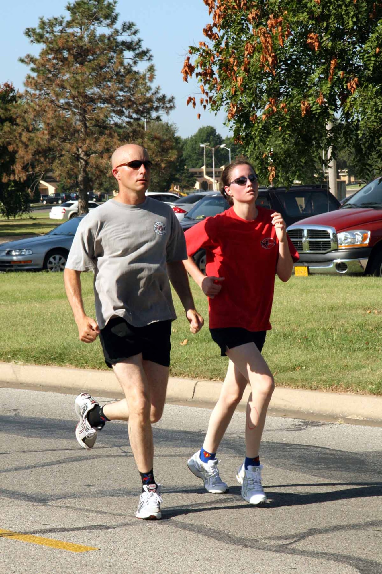 Triathletes pace their way to the finish line after running 5K.  (Air Force photo by Becky Pillifant)