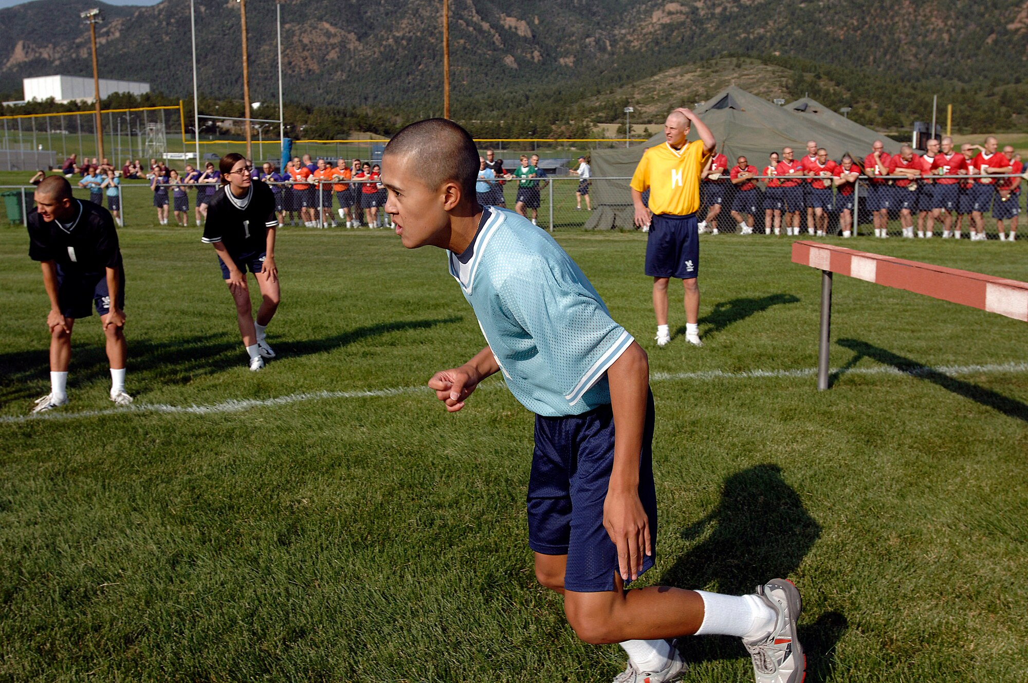 U.S. Air Force Academy basic cadet Tate Montgomery participates in the steeplechase event during Field Day July 12 at the Academy's athletic fields in Colorado Springs, Colo.  Cadets compete in various athletic events to test their teamwork and athletic skills.  (U.S. Air Force photo/Dave Ahlschwede)