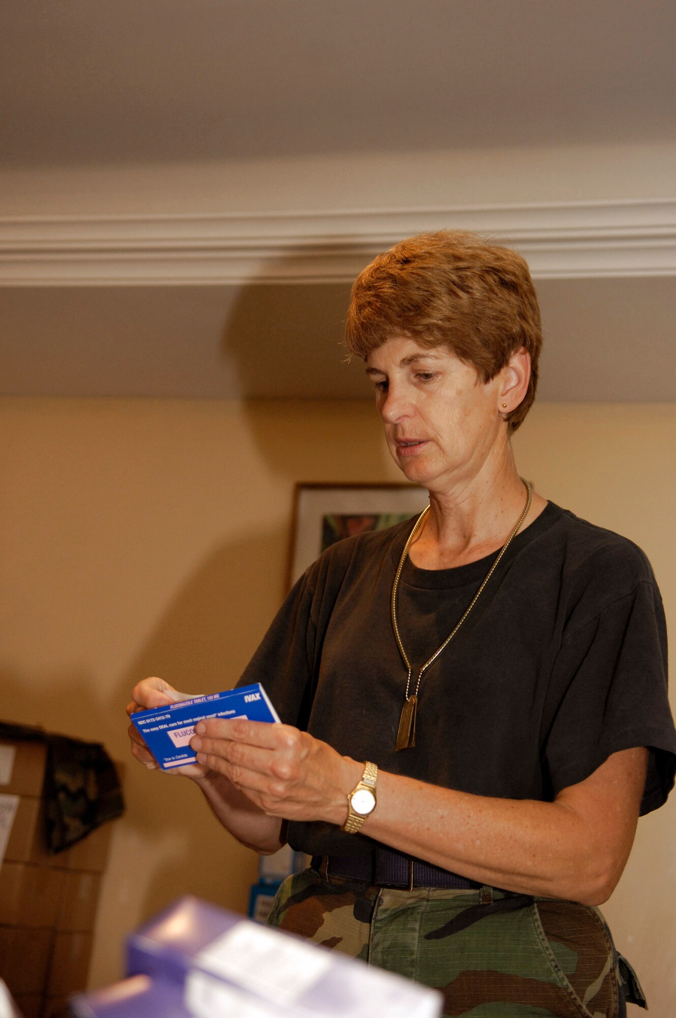 Maj. Linda Demary labels one of more than 40 medicines that will be distributed to thousands of Malians during MEDFLAG 08, July 14. More than 90 servicemembers deployed to Bamako, Mali, for MEDFLAG 08, a multinational medical training exercise designed to enhance medical capabilities and readiness for U.S. and African Forces. Maj. Demary is a nurse deployed from the 31st Medical Group, Aviano Air Base, Italy. (U.S. Air Force photo/Senior Airman Michael S. Dorus)