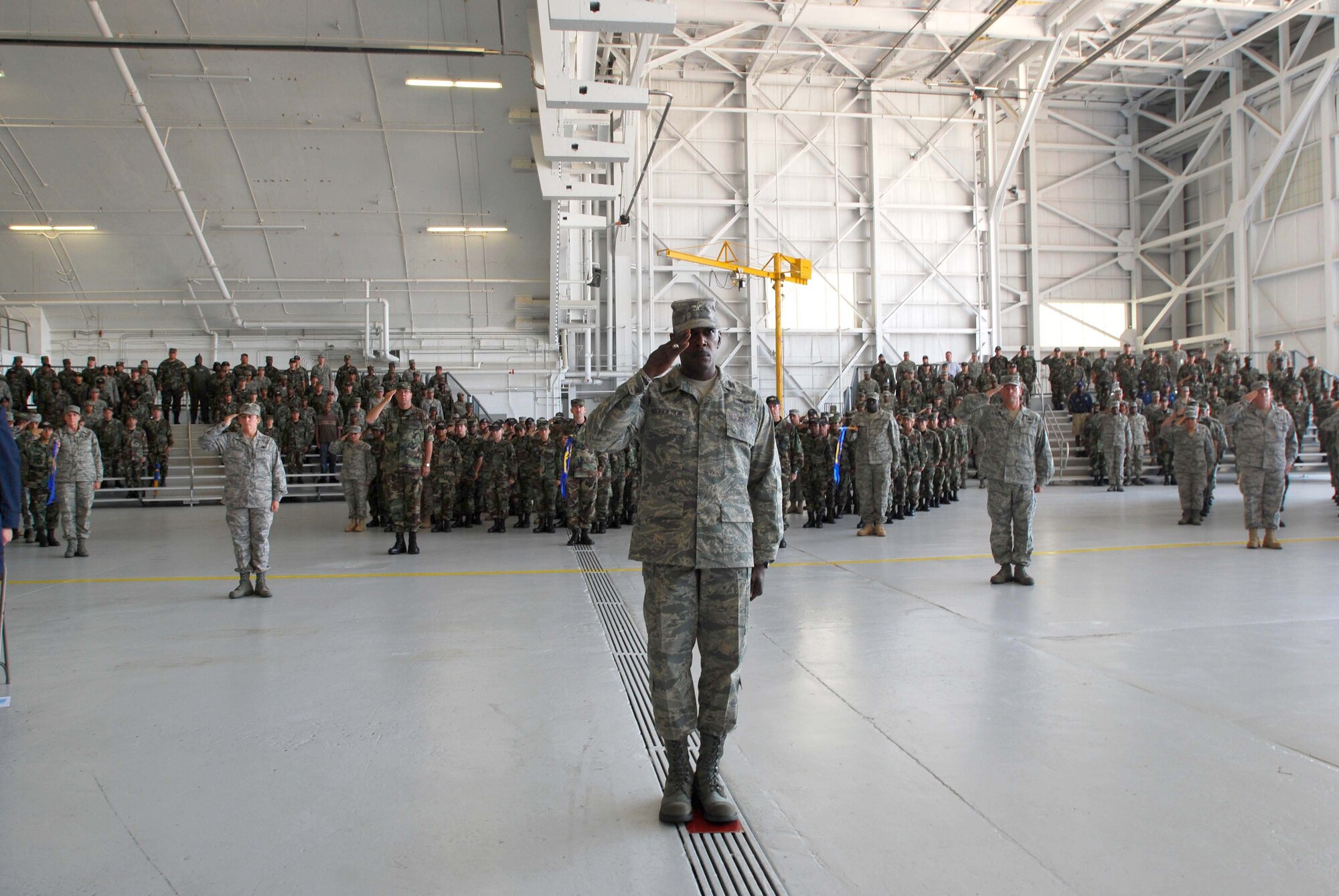 ANDREWS AIR FORCE BASE, Md. -- Col. Arthur Nicholson, 459th Aerospace Medicine Squadron commander, leads members of the 459th Air Refueling Wing in a final salute to outgoing 459th ARW Commander Col. Stayce Harris during a change of command ceremony July 13. Incoming and current 459th ARW Vice Commander Col. Tim Cahoon assumes command Aug. 1. (U.S. Air Force photo/Senior Airman Ashley B. Crawford)