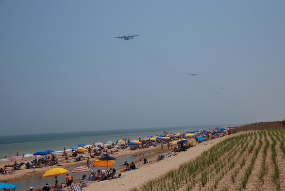 A five-ship large formation of Delaware Air National Guard C-130 transport aircraft from the 166th Airlift Wing in New Castle, Del. in flight heading north offshore from Bethany Beach, Delaware during a 700-mile, three-hour training flight on June 7, 2008 over four states (Del., Md., Va., and N.J.) culminating in an airdrop over Coyle Field, N.J. and a return to home station at New Castle Airport, Del.