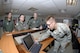 Staff Sgt. Matthew Pogreba, 92nd Operations Support Squadron weather journeyman, briefs pilots on weather conditions prior to flight at the weather shop at Fairchild Air Force Base, WA on June 06, 2008 at 1950 ZULU. (U.S. Air Force photo/Staff Sgt. Staff Sgt. James T. May II)
