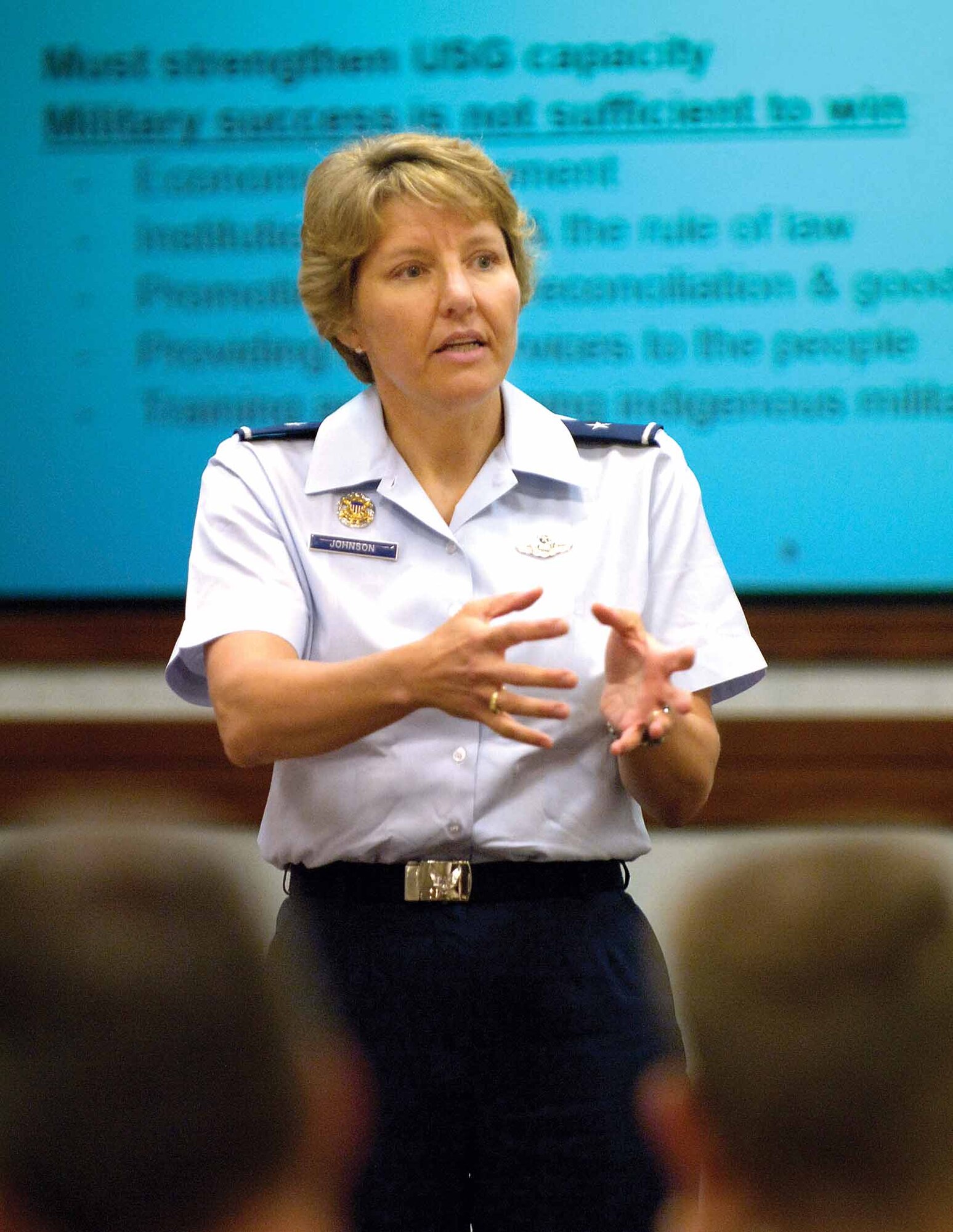 Brig. Gen. Michelle Johnson described her role in the war on terrorism and the increasing threat of cyber-terrorism when she spoke July 2 to Tinker’s Senior Leaders’ Forum in the Oklahoma City Air Logistics Center.  General Johnson, the deputy director for the War on Terrorism, Strategic Plans and Policy Directorate at the Pentagon,  also took questions and shared her thoughts on the qualities of a good leader, stressing the importance of not being a controller but being humble and asking informed questions.  (Air Force photo by Margo Wright)

