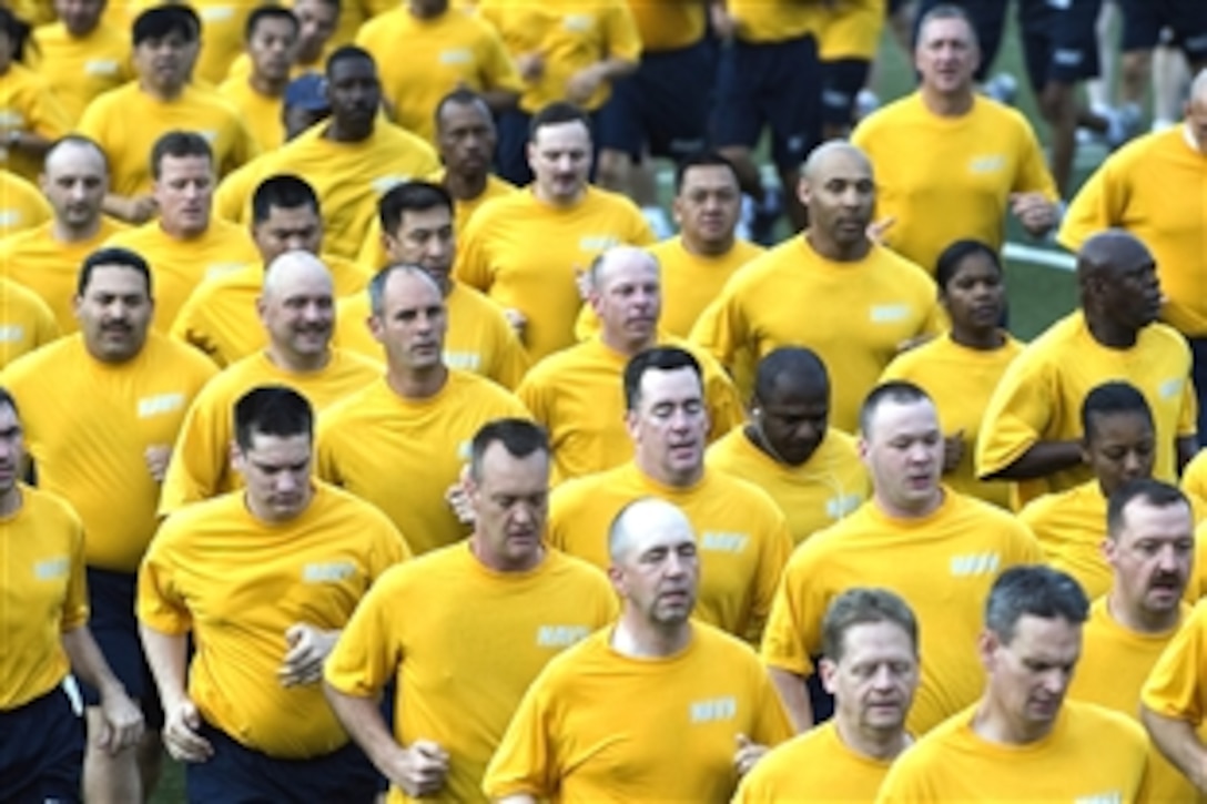 U.S. Navy chief petty officers assigned to Naval Facilities Engineering Command, Far East and the USS Blue Ridge, run in formation during a morning physical training session, Yokosuka, Japan, July 17, 2008. 