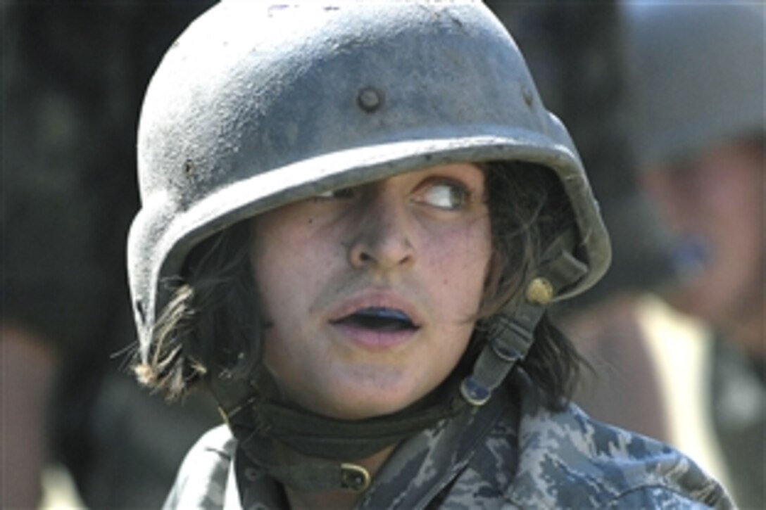 Basic cadet Anne Koons learns hand-to-hand combat skills during the field training portion of basic training at the U.S. Air Force Academy, Colorado Springs, Colo., July 16, 2008. 