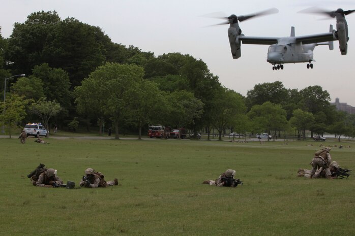 NEW YORK -- Marines from Special Purpose Marine Air Ground Task Force New York demonstrate a helicopter raid at Orchard Beach, Bronx, May 28.  More than 3,000 Marines, Sailors and Coast Guardsmen will be in the area participating in community outreach events and equipment demonstrations. This is the 26th year New York City has hosted the sea services for Fleet Week.