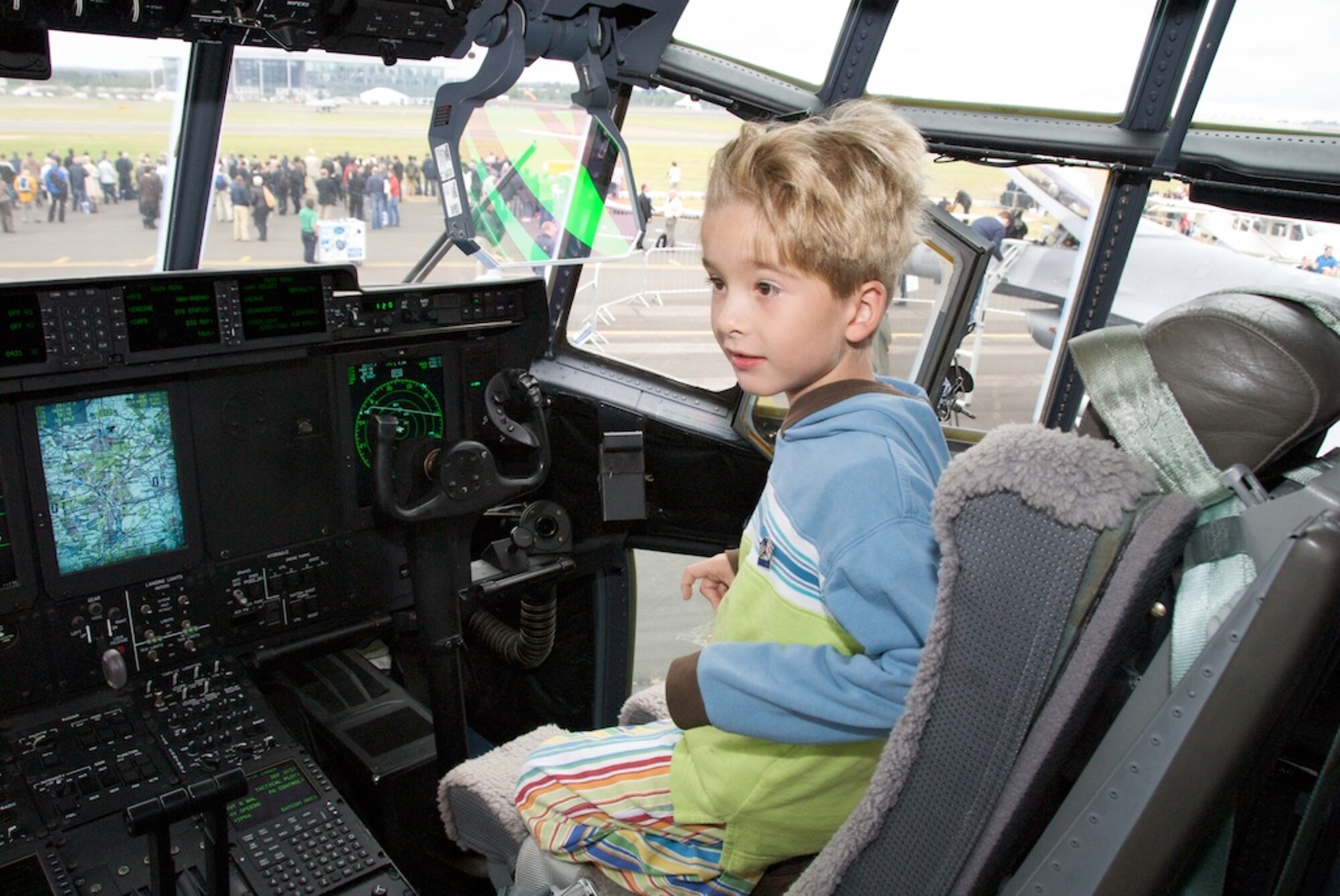 Aspiring aviator, Lucas Kaighin sits in the pilot seat of the Air Force Reserve C-130J from the 815th Airlift Squadron Flying Jennies.

Thousands of people from across the world have toured the C-130J at the largest air show in the world, Farnborough.

The air show presents a rare opportunity for children of all ages to see up close the most technologically advanced C-130 in the world.

"I never realized how many capabilities this plane (the J-Model) has," said one aviation enthusiast.

The Flying Jennies will continue to host guests at the air show till Sunday, July 20, 2008.