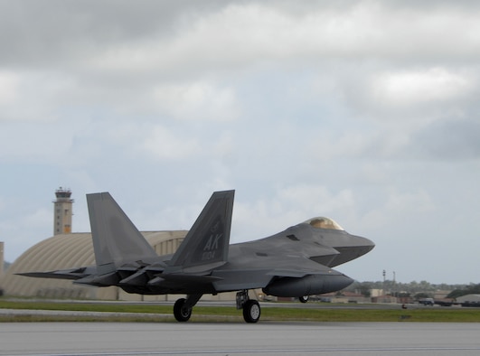 A U.S. Air Force F-22A Raptor assigned to the 90th Expeditionary Fighter Squadron out of Elmendorf Air Force Base, Alaska lands at Andersen Air Force Base, Guam July 20. The F-22A, a critical component of the Global Strike Task Force, is designed to project air dominance, rapidly and at great distances and defeat threats attempting to deny access to our nation's Air Force, Army, Navy and Marine Corps. The F-22A cannot be matched by any known or projected fighter aircraft. 
 (U.S. Air Force by Airman 1st Class Courtney Witt)
