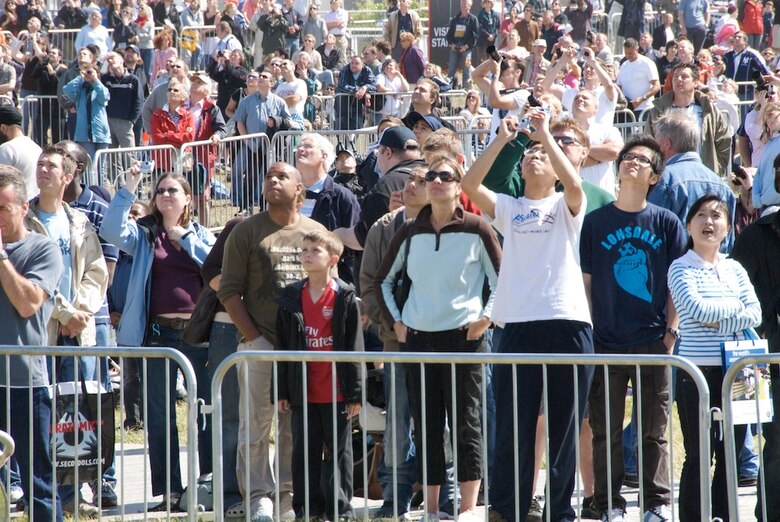 The crowds look to the sky as aircraft demonstrate aerobatics at the Farnborough Air Show.

More than a quarter of a million people toured the aircraft at the airshow to include the Air Force Reserve C-130J of the 403rd Wing's Flying Jennies.

The Farnborough Air Show is this year's largest air show in the world.