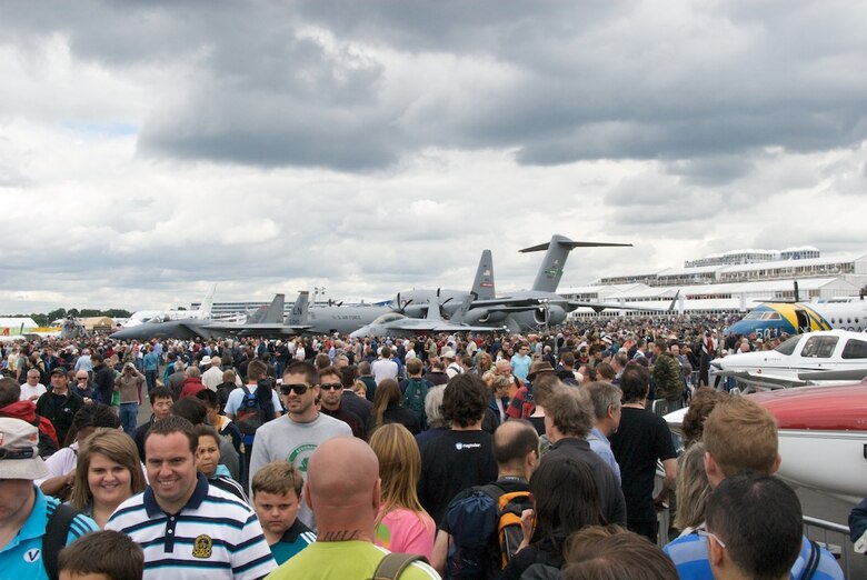 Crowds line up to tour the world's most technologically advanced C-130, the J-Model of the U.S. Air Force Reserve Flying Jennies.  More than a quarter of a million people toured went to the Farnborough Air Show.  The 815th Airlift Squadron showcased their tactical airlift mission at the world's largest air show.