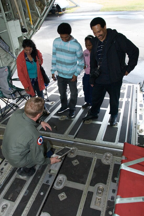 Senior Master Sergeant Eric Gassiott demonstrates the cargo capabilities to aviation enthusiasts at the Farnborough Air Show 2008.  Fans were extrememly impressed with the unique and record-setting capabilites of the C-130J of the Air Force Reserve 815th Airlift Squadron Flying Jennies.  The Jennies hosted groups of tours for the general public, Congressional delegate and foreign dignataries through the week at the world's largest air show.