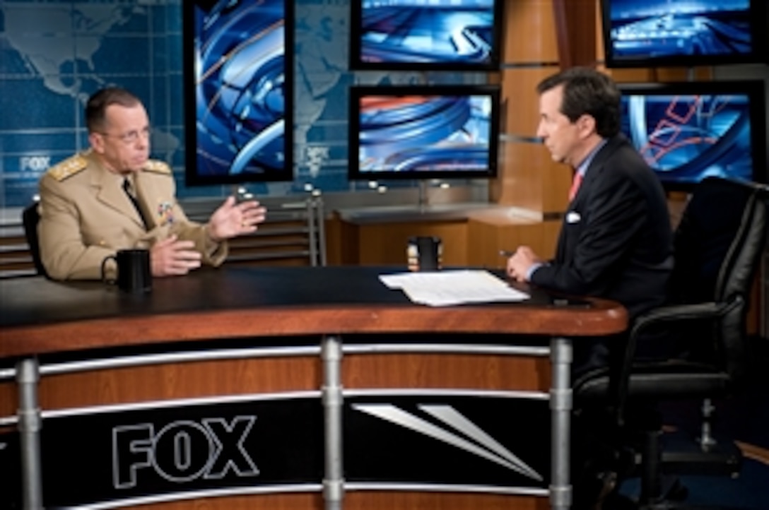 U.S. Navy Adm. Mike Mullen, chairman of the Joint Chiefs of Staff, talks with Chris Wallace, host of Fox News Sunday, Washington, D.C., July 20, 2008. 