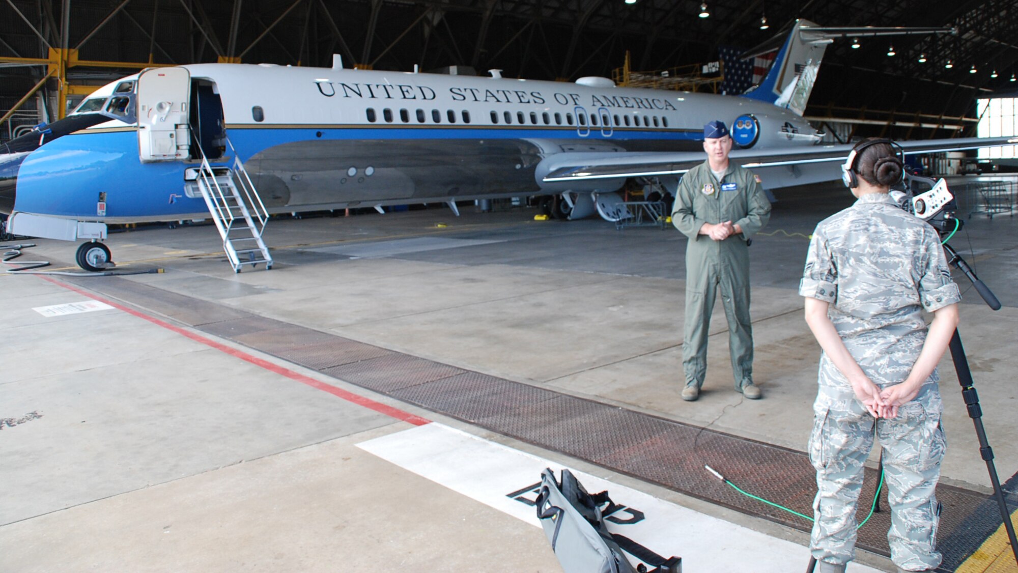 Standing tall in front of the Air Force Reserve Command's C-9C distinguished visitor aircraft, the commander of the 932nd Airlift Wing's Operations Group, Col. Thomas Kirkendall, recently took time out for a special interview.  He spoke with pride about his favorite memories of 2007 during the filming of a documentary.  He talked about pride in the men and women who took on three brand new C-40C aircraft during the year, and opportunities for airmen to become flight attendants.  Photo/Maj. Stan Paregien