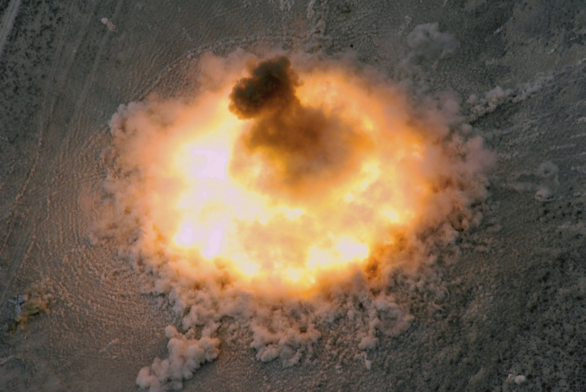 The last 15,000-pound Bomb Live Unit-82 donates after being dropped from an MC-130E Combat Talon I from the 919th Special Operations Wing from Duke Field, Fla., July 15 at the Utah Test and Training Range. (U.S. Air Force photo/Capt. Patrick Nichols) 
