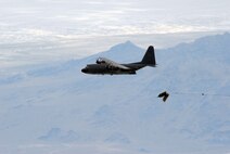An MC-130E Combat Talon I from the 919th Special Operations Wing from Duke Field, Fla., drops the last operational 15,000-pound BLU-82 bomb July 15 at the Utah Test and Training Range. (U.S. Air Force photo/Capt. Patrick Nichols) 