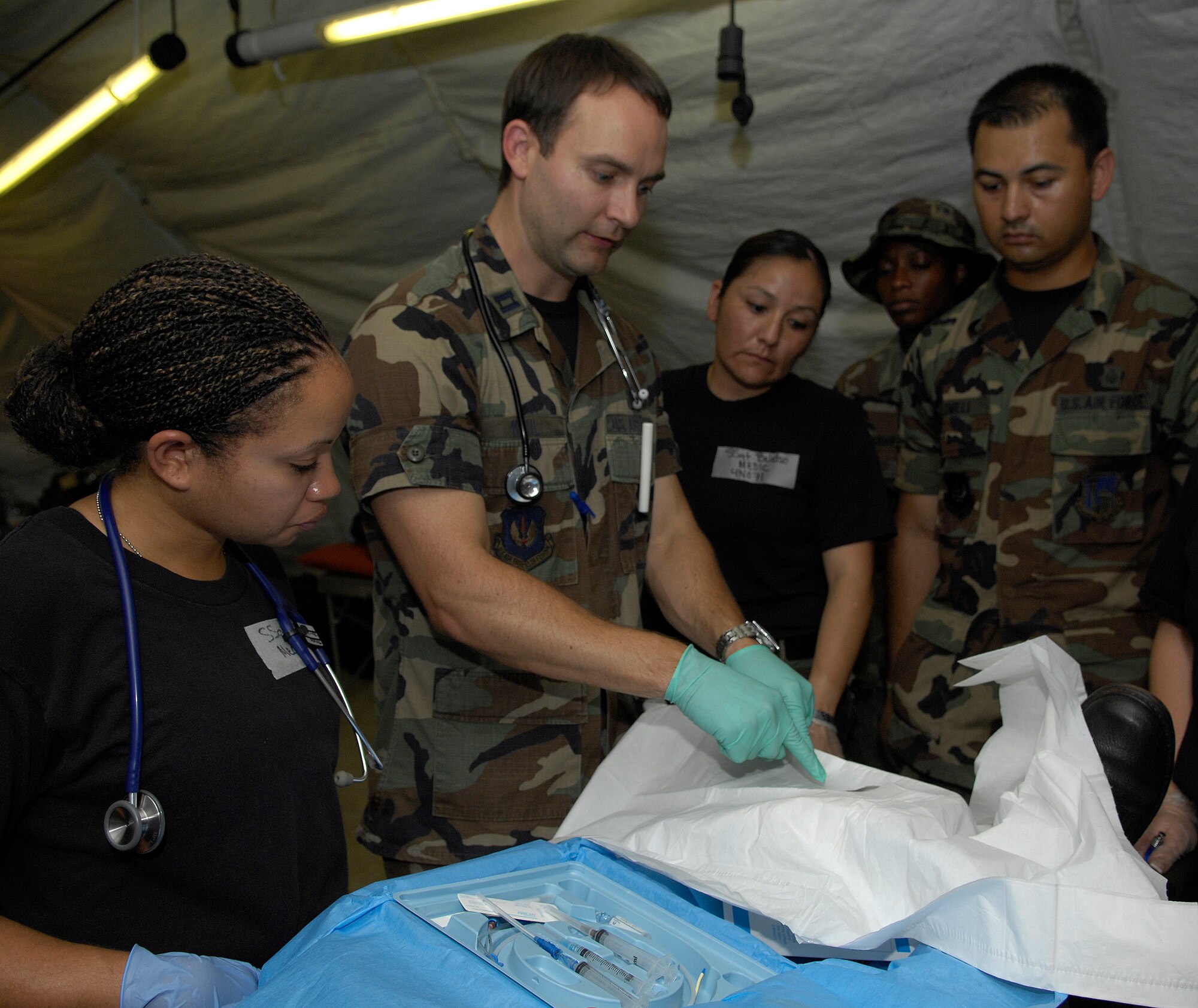 BAMAKO, Mali -- Capt. Chad Khal teaches Airmen about central line insertion procedures during the Mass Casualty portion of MEDFLAG 08, July 18, 2008.  More than 90 servicemembers deployed to Bamako, Mali, for MEDFLAG 08, a multi-national medical training exercise designed to enhance medical capabilities and readiness for U.S. and African Forces.  Captain Khal is a family practitioner deployed from the 31st Medical Group, Aviano Air Base, Italy.  (U.S. Air Force photo/Senior Airman Michael S. Dorus)
