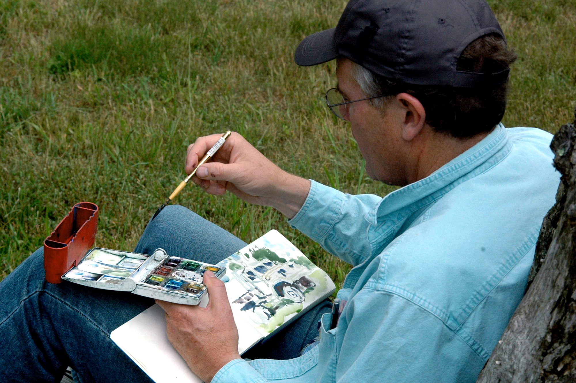 Artist John Finger of Walnut Creek, Calif., paints a scene during a visit to a Fort Dix, N.J., range to document the Air Force Phoenix Warrior Training Course for the Air Force Art Program June 20. He was one of five artists visiting the U.S. Air Force Expeditionary Center and its courses to create future works of art for the program. (U.S. Air Force Photo/Tech. Sgt. Scott T. Sturkol)