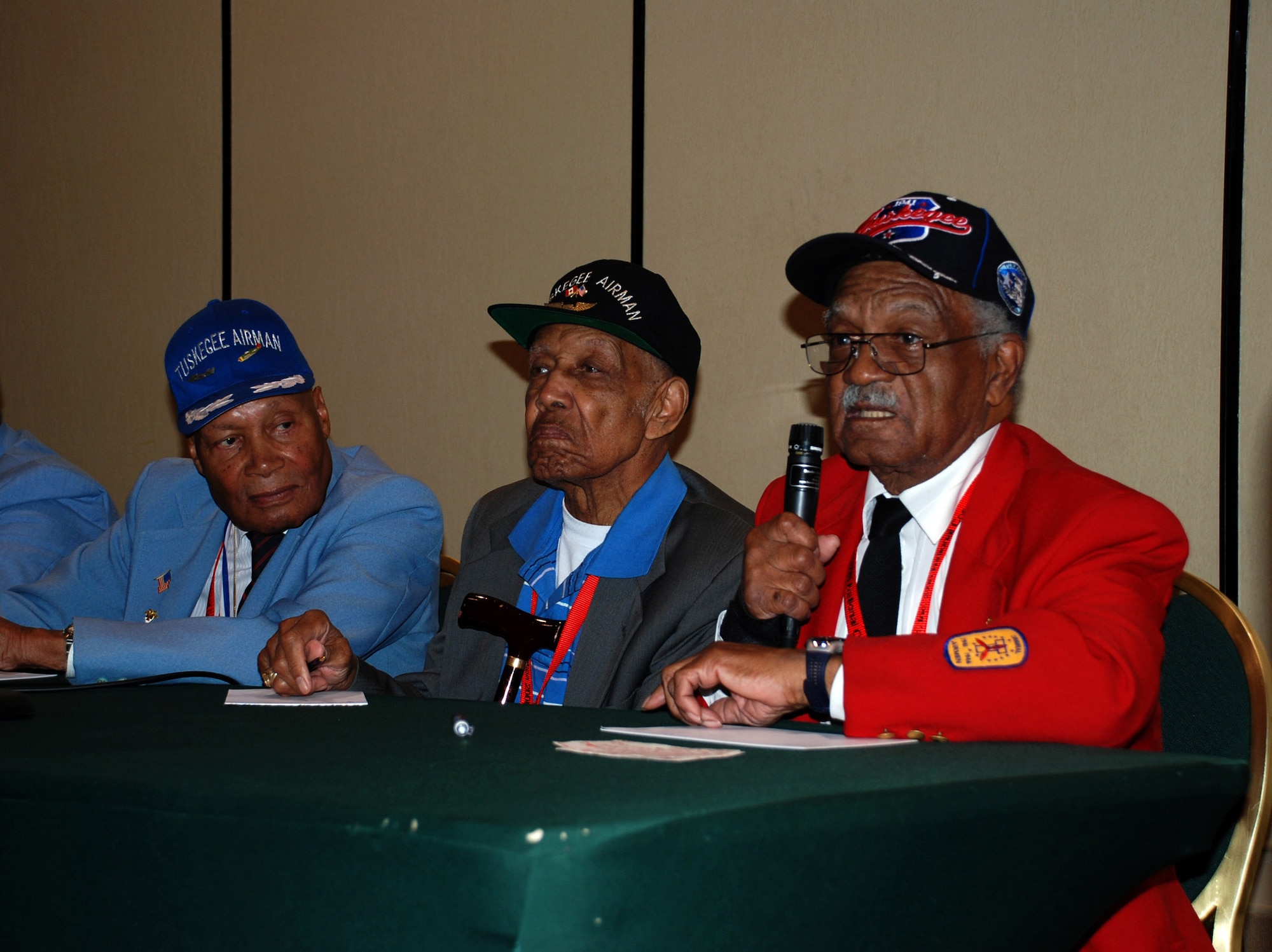 William Fauntroy (right) speaks during an open forum at the Tuskegee Airmen Convention July 19 in Philadelphia. Mr. Fauntroy is an original Tuskegee Airman pilot. Seven Tuskegee Airmen pilots spoke about their personal experiences as some of the first African-American pilots and answered questions posed by the audience. Topics included integration into the Army, their motivations to fly and the challenges they faced being African-Americans during a time of racial segregation. (U.S. Air Force photo/Airman 1st Class Bekah Phy) 
