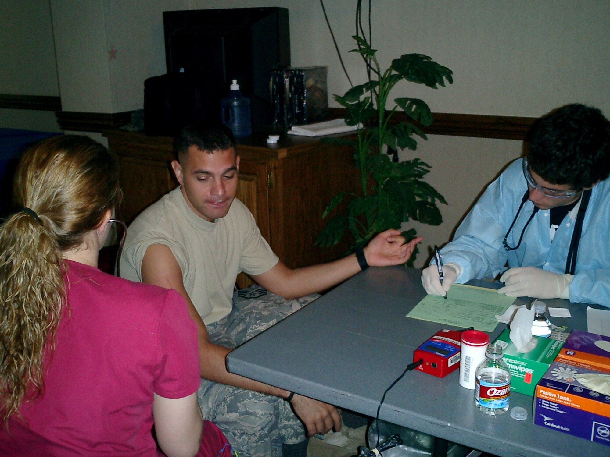 DYESS AIR FORCE BASE, Texas -- A Dyess Airman is medically screened by Meeks Blood Center staff during a Dyess Blood Drive. Several base organizations along with the Meeks Blood Center sponsored a blood drive at the Heritage Club July 16. (U.S. Air Force photo)