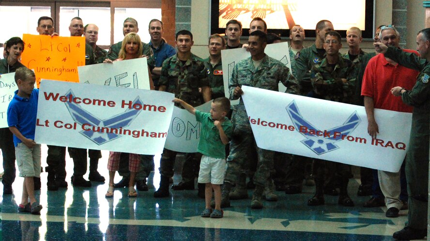 EGLIN AIR FORCE BASE, Fl. -- Lt. Col. Charles Cunningham's family and friends welcome him home after his recent deployment to Iraq which Col. Cunningham received the Bronze Star Medal for the meritorious achievements he made there. (US Air Force photo by Airman 1st Class Anthony Jennings)