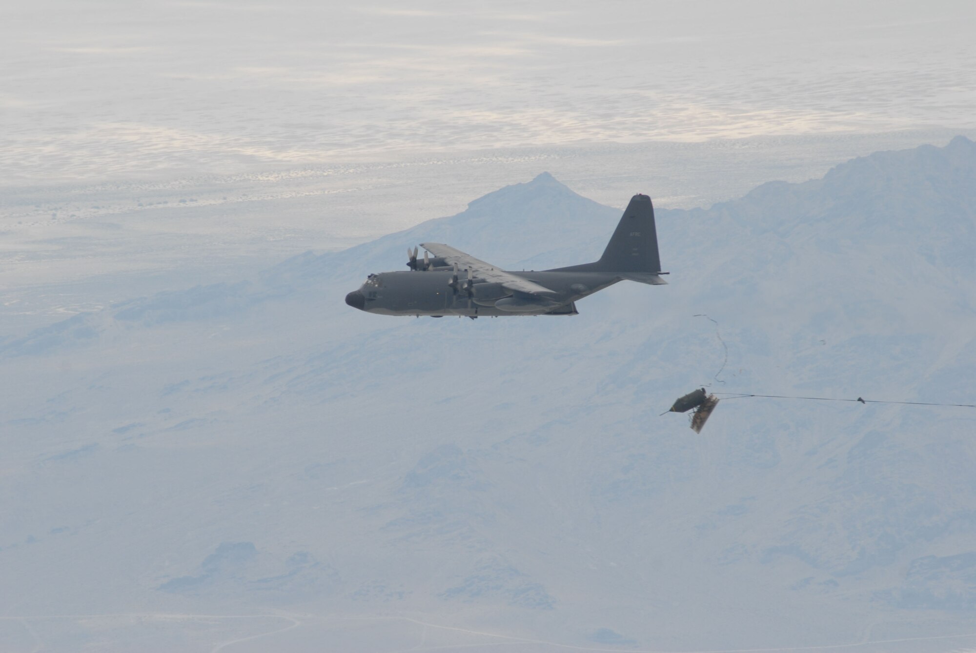 An MC-130E from the 711th Special Operations Squadron, 919th Special Operations Wing, Duke Field, Fla., drops the last operational 15,000-pound BLU-82 bomb at the Utah Test and Training Range on July 15, 2008. (U.S. Air Force photo/Capt. Patrick Nichols)