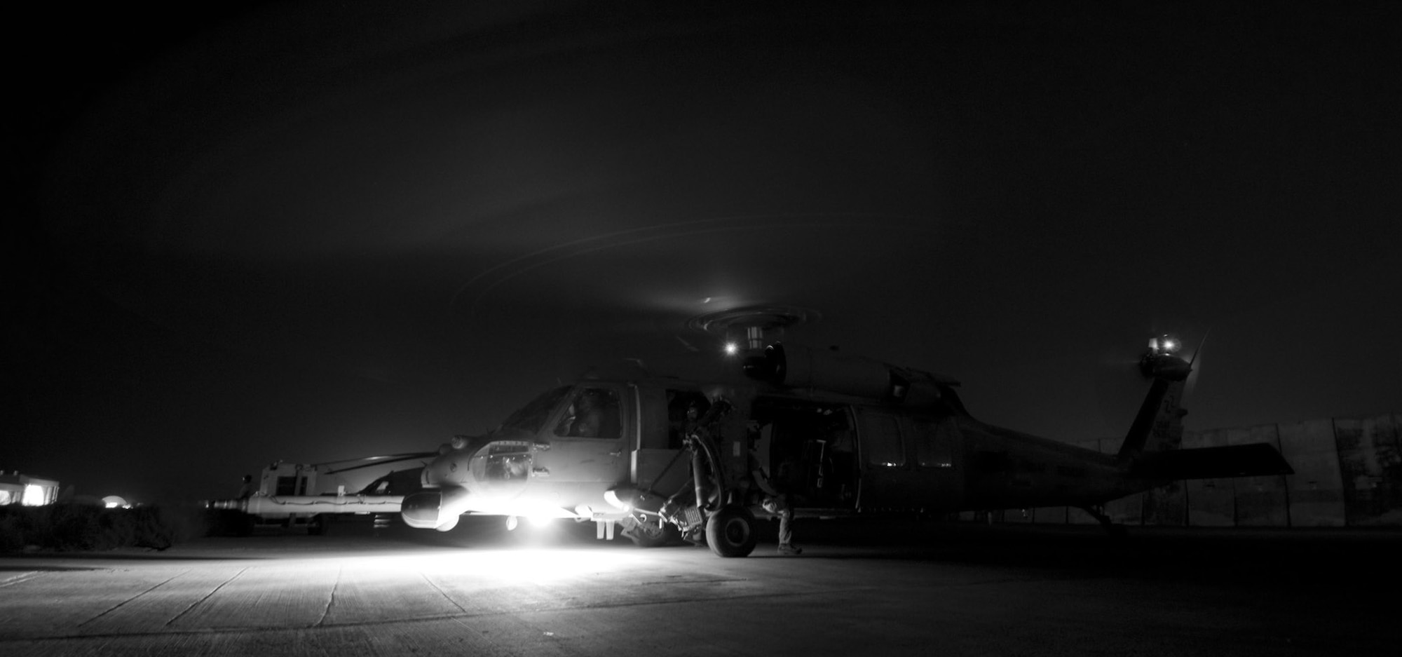 An HH-60 Pave Hawk spins up its rotors for takeoff July 17 at Bagram Air Base, Afghanistan. All HH-60Gs have night-vision goggles with lighting and a forward looking infrared system that make this airframe ideal for performing medical evacuation missions in adverse conditions, even under a new moon. (U.S. Air Force photo/Staff Sgt. Samuel Morse) 
