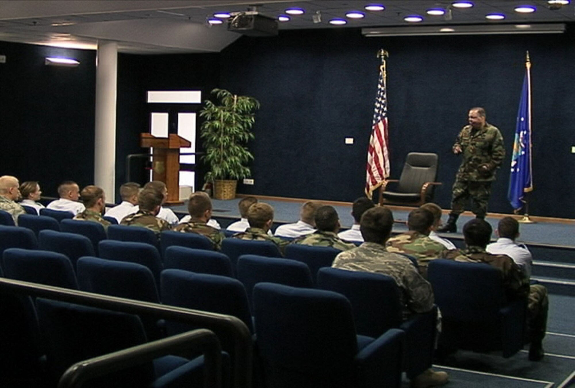 Tech Sgt. Israel Del Toro, an Operation Enduring Freedom war veteran, speaks with Aviano Airmen attending the First Term Airmen's Center, about his experiences as a joint terminal attack controller and overcoming injuries he sustained in Afghanistan. (U.S. Air Force photo)