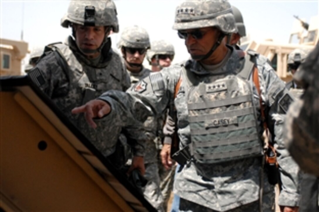 Gen. George Casey, Army chief of staff, right, discusses market revitalization projects in Baghdad's Sadr City neighborhood with Army Brig. Gen. Jeffrey Talley, July 21, 2008. Talley is commander of the 926th Engineer Brigade, Multi-National Division – Baghdad.


